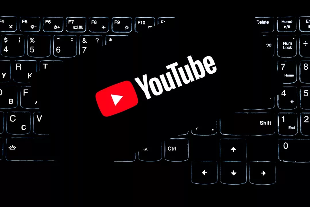Music royalties from YouTube - Youtube logo on a backlit keyboard.